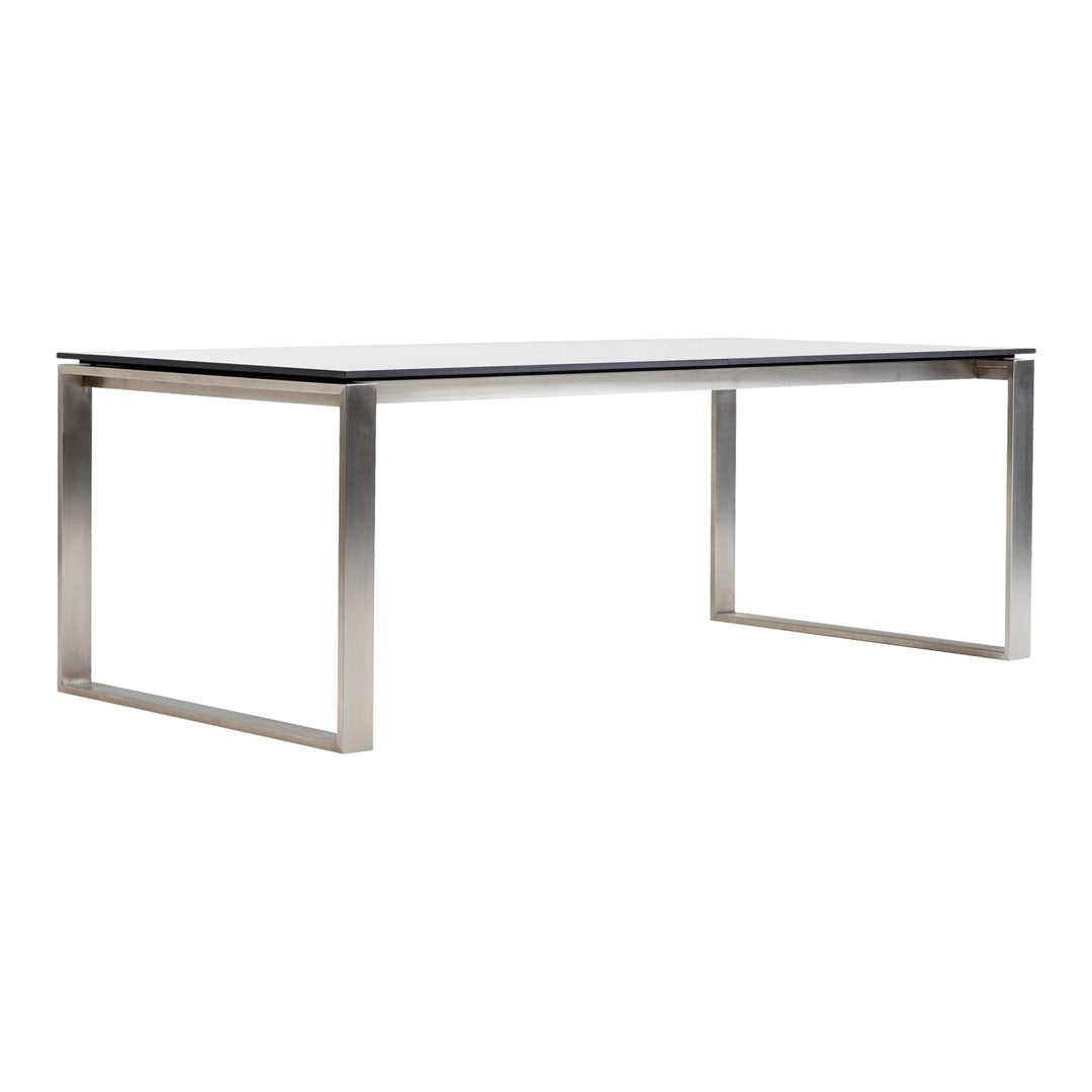 Sleek rectangular table with a glossy black surface and metallic silver legs, featuring a modern minimalistic design.