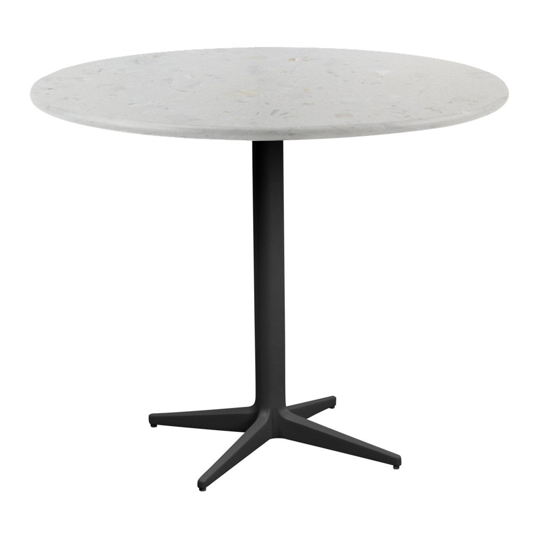 Round table with a smooth white marble top and a sleek black metal base, perfect for modern decor.