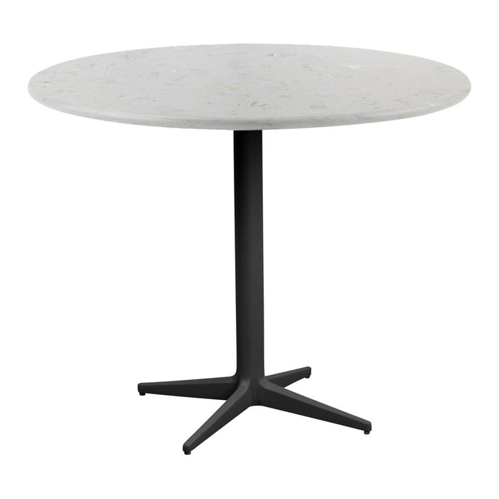 Round table with a smooth white marble top and a sleek black metal base, perfect for modern decor.