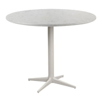 Round white marble table with a smooth surface and minimalist white base, perfect for modern decor.