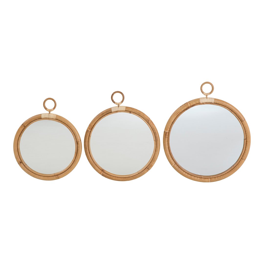 Set of three round mirrors with natural bamboo frames, showcasing a minimalistic, earthy aesthetic.