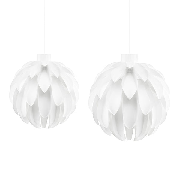 White pendant lights featuring a floral petal design, perfect for modern decor. Elegant and minimalistic.