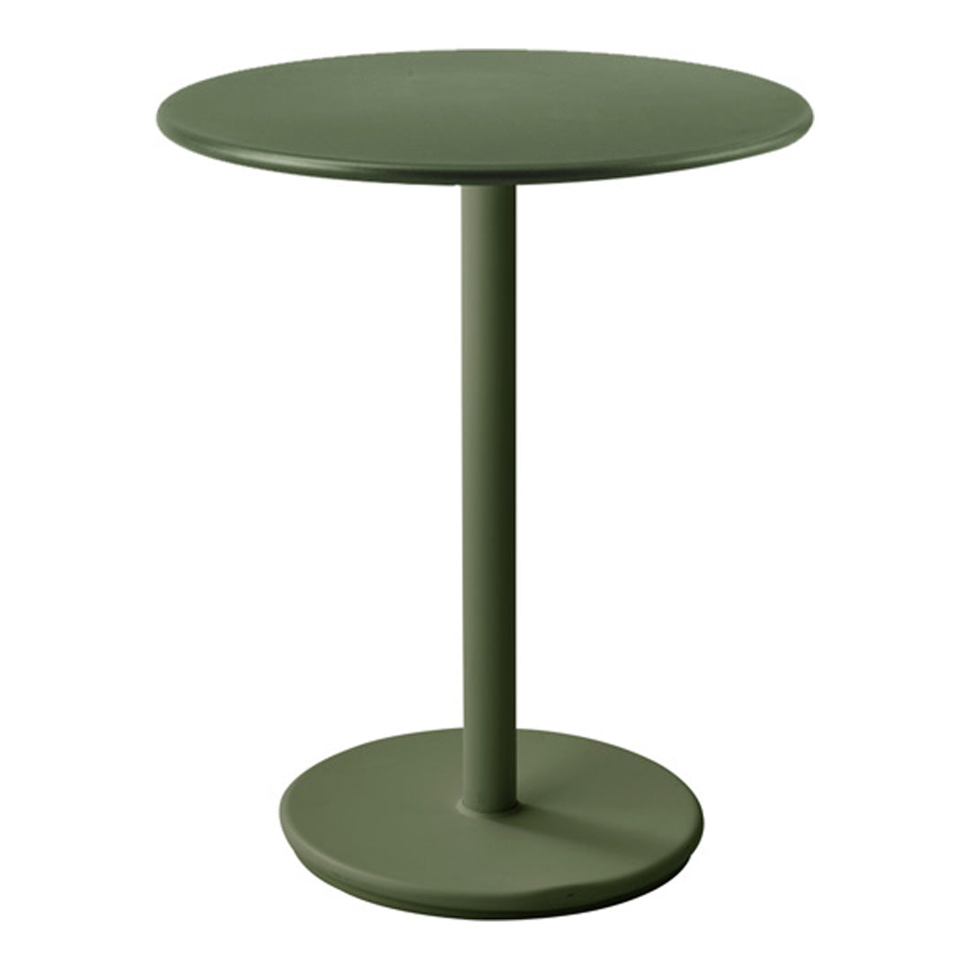 Green round table with a smooth finish and a sleek, modern design for contemporary spaces.