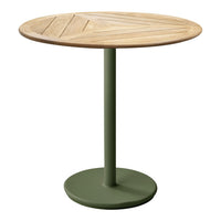 Round wooden table with a light wood grain top and a sleek green metal base, featuring a geometric pattern.