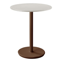 Round side table with a sleek white top and sturdy brown base, perfect for modern decor.
