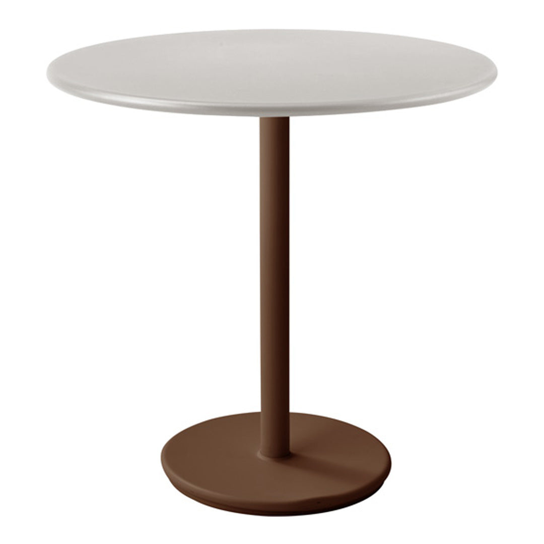 Round table with a white top and a brown base, featuring a smooth, minimalist design. Ideal for modern decor.