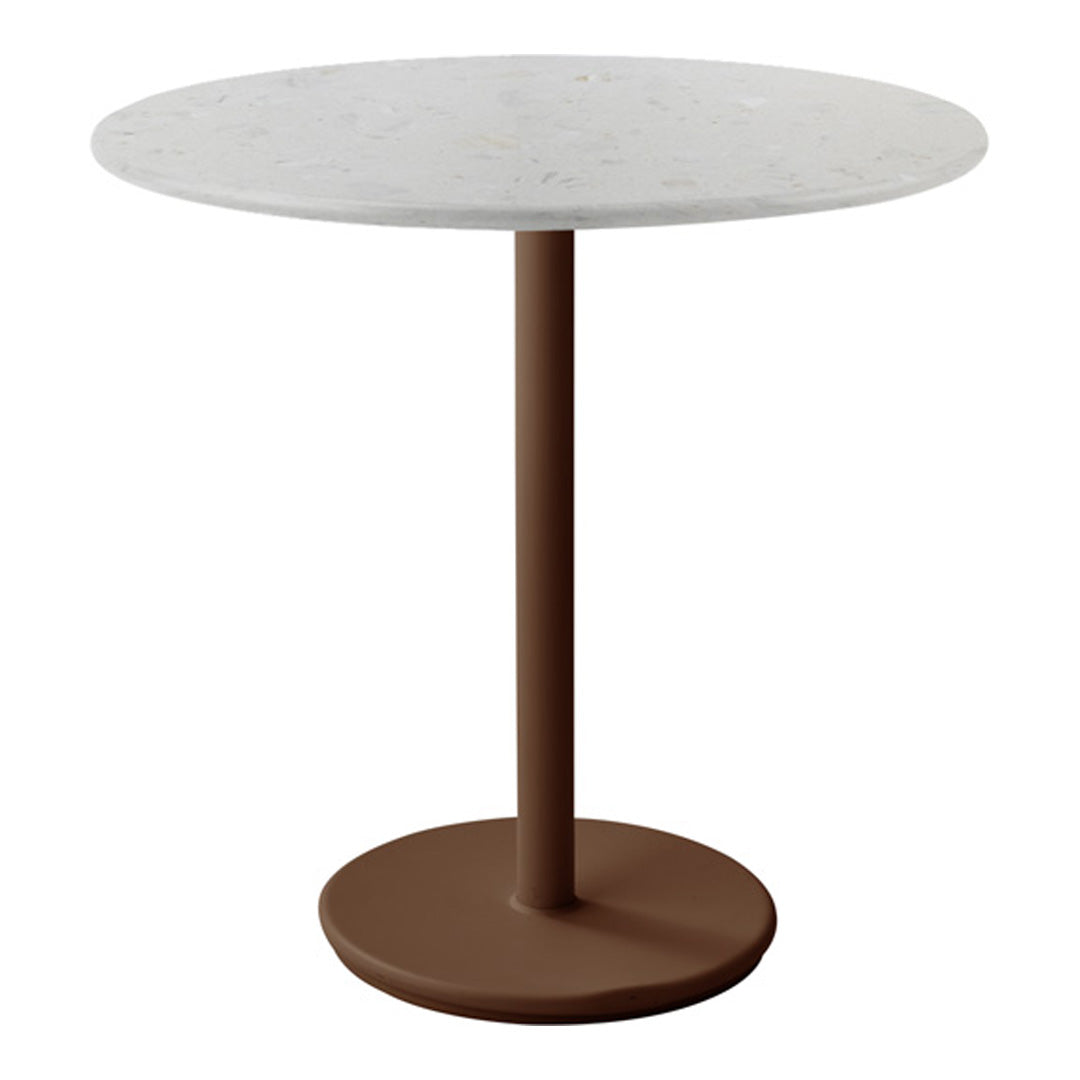 Round table with a white speckled top and a brown metal base, offering a modern, minimalist design.