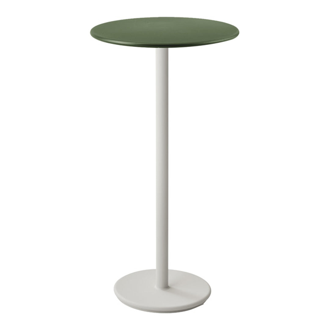 Green circular tabletop on a sleek white pedestal base, modern minimalist design for contemporary settings.