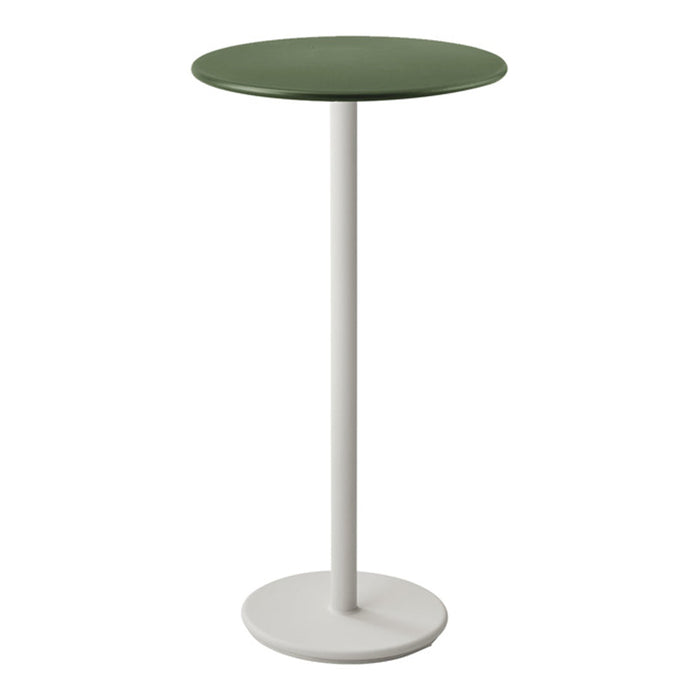 Green circular tabletop on a sleek white pedestal base, modern minimalist design for contemporary settings.