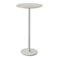 Minimalist round side table in soft white, featuring a sleek, smooth finish and a simple, modern design.
