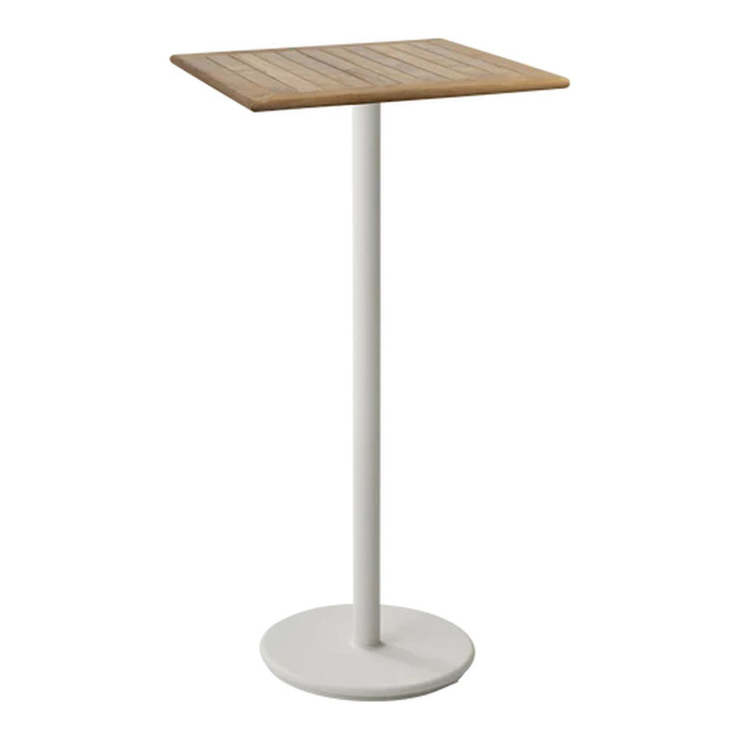 Minimalist table with a square wood top and a sleek white metal base, combining natural and modern design elements.