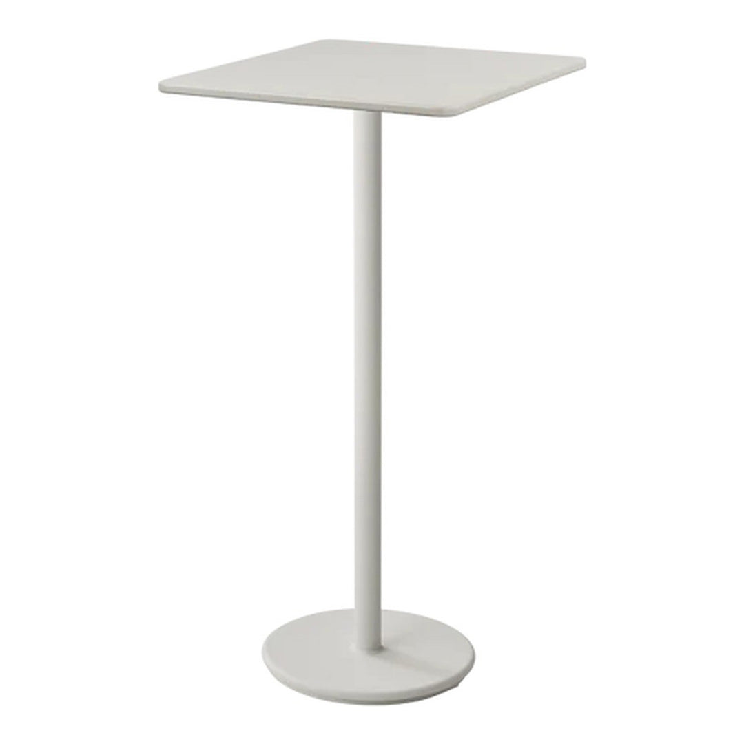 Minimalist white square side table with a sleek, smooth finish and a sturdy round base. Ideal for modern decor.
