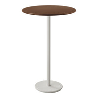 Round table with a rich brown top and a sleek white pedestal base, perfect for modern decor.