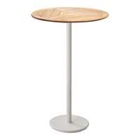 Round wooden table with a light oak finish and textured pattern, paired with a white metal base. Ideal for modern decor.