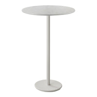 Round white table with a smooth surface and sleek, minimalistic design featuring a solid white base.