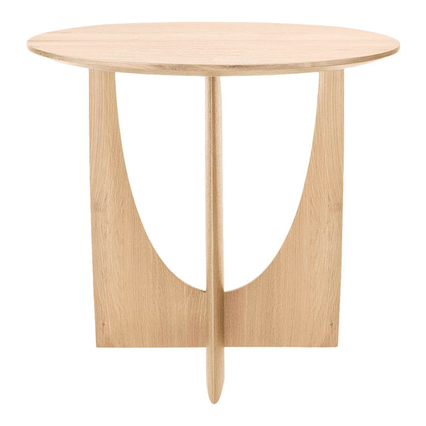 Light oak round table with a minimalist design and smooth circular top, featuring a unique U-shaped base.