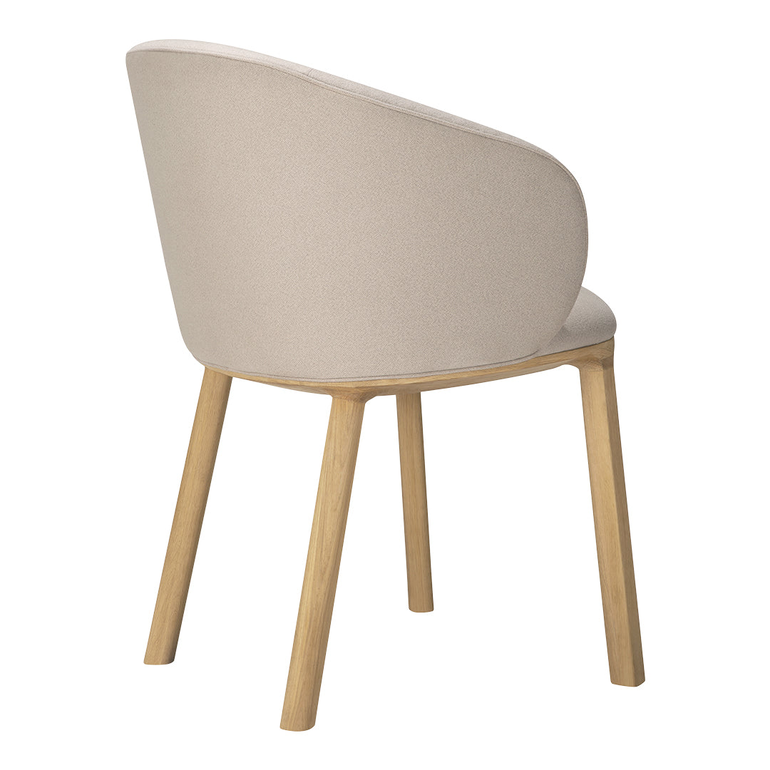 Beige upholstered chair with a smooth texture and light wooden legs, featuring a minimalist design.
