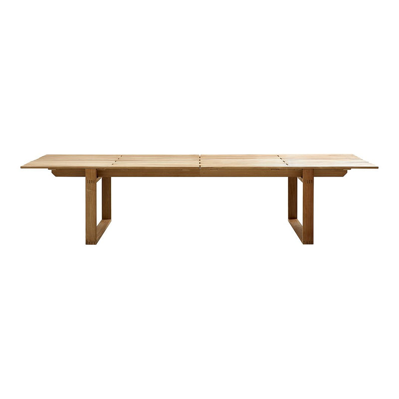 Natural wood dining table with a light oak finish and sleek, minimalist design. Perfect for modern interiors.