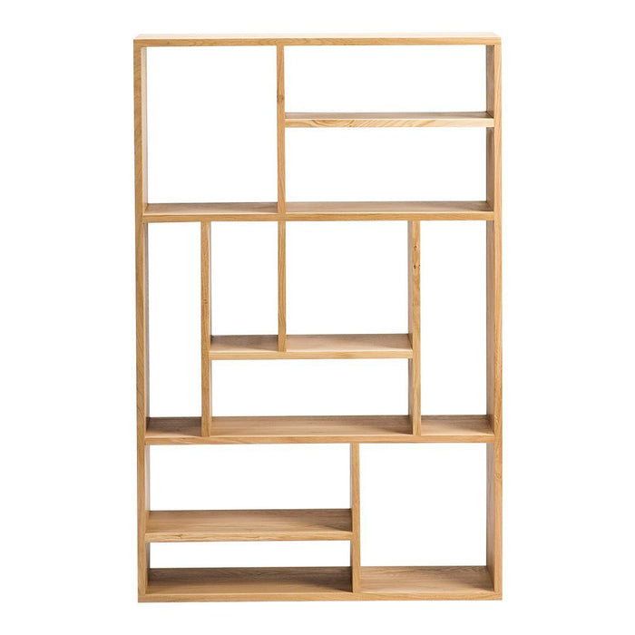 Natural wood bookshelf featuring a geometric design with various open compartments and warm, light oak tones.