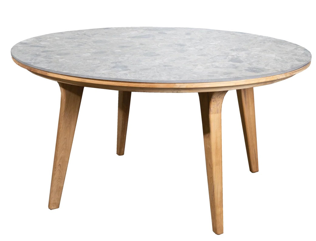 Round table with a gray marble top and natural wood legs, showcasing a sleek, modern design.