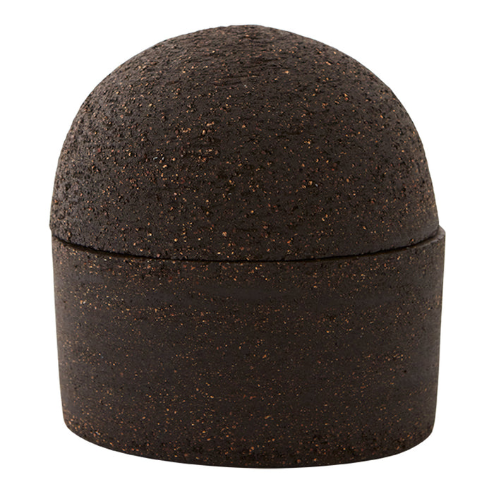Round brown container with a textured surface and subtle golden specks. Elegant and modern design.