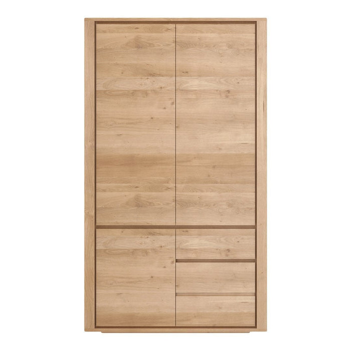 Light oak wood wardrobe with a smooth finish and minimalist design, featuring vertical and horizontal panel patterns.