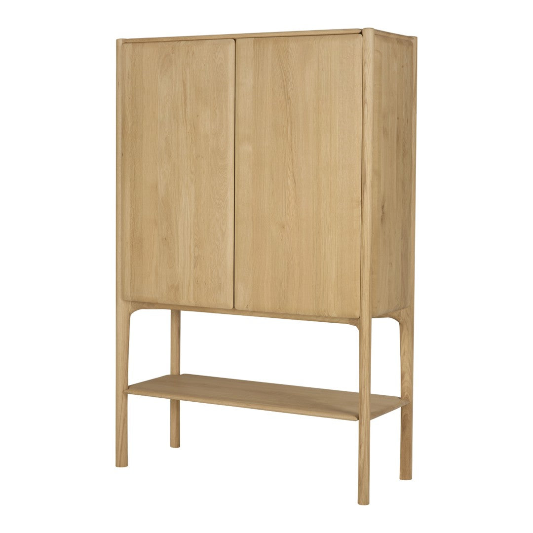 Light oak wood cabinet with a minimalist design and smooth, natural grain pattern. Stylish and modern home storage solution.