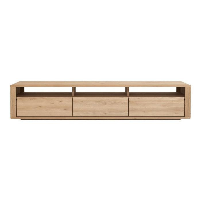 Light oak TV stand with a smooth, natural wood finish and minimalist design, featuring three spacious drawers.