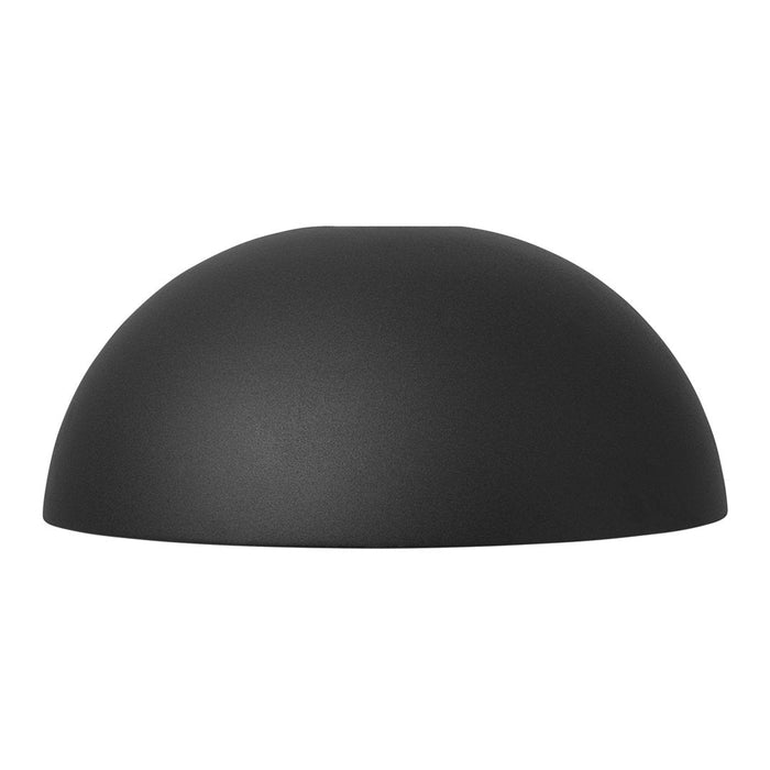 Matte black dome lamp showcasing a sleek, minimalist design with a smooth, even surface.