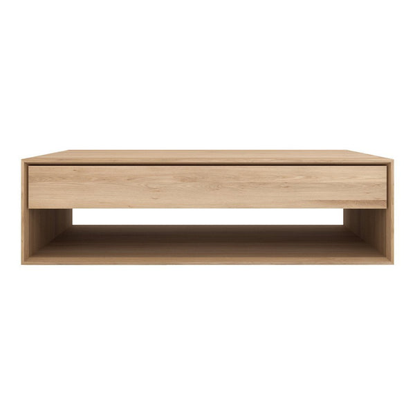 Light wood coffee table with a smooth finish and minimalist design, featuring a simple, natural pattern.