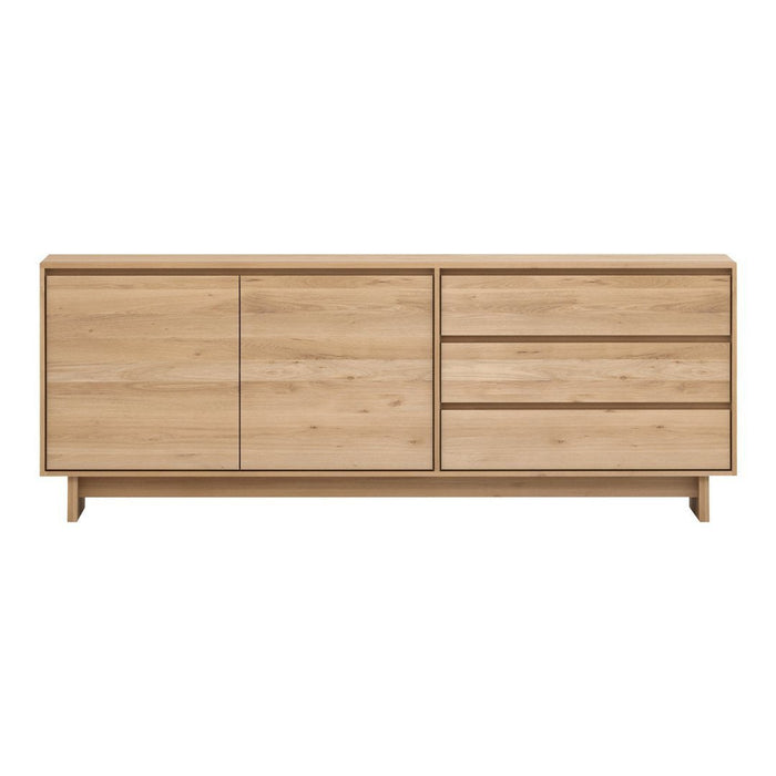 Light oak wood sideboard with a smooth finish, featuring minimalistic design and natural grain patterns.