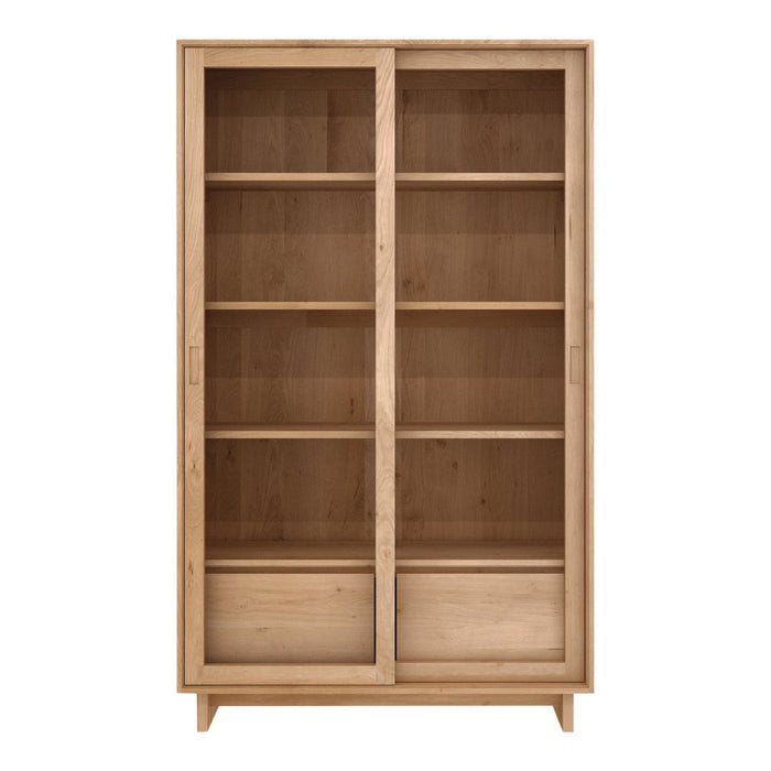 Natural wood bookshelf with a light finish, featuring a minimalist design and smooth, clean lines.