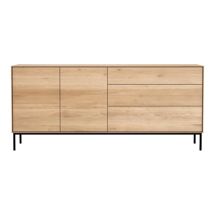 Light oak wood dresser with a smooth finish and sleek black metal legs, featuring a minimalist design.