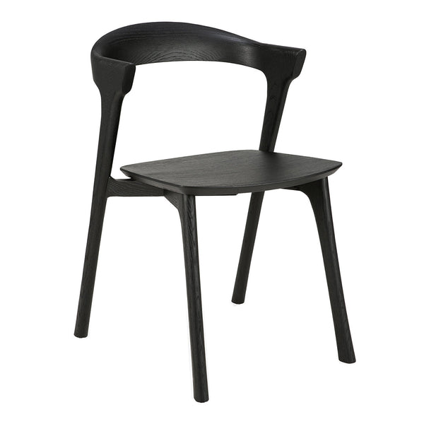 Black modern chair with a minimalist design and smooth, curved lines. Perfect for contemporary spaces.