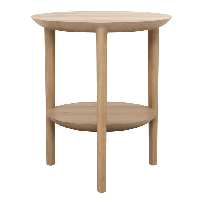 Natural wood round side table in light beige with a smooth finish and minimalistic design.