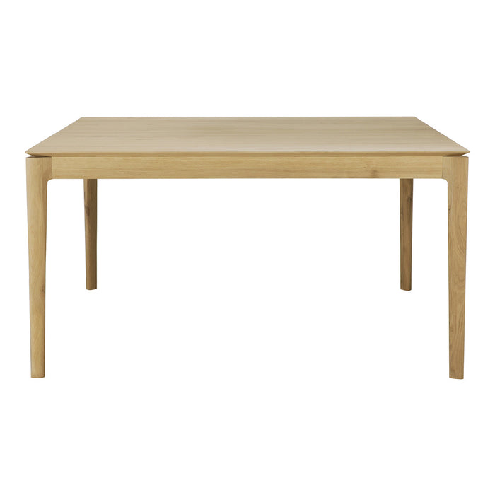 Natural wood dining table with a light oak finish and clean, minimalistic design, perfect for modern decor.