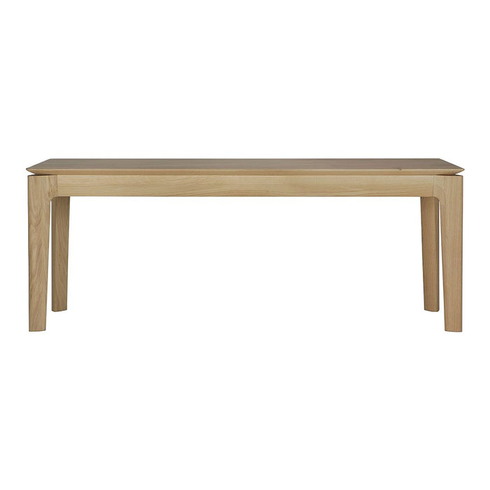 Light wood dining table with a smooth, natural finish and simple, clean lines. Ideal for modern interiors.