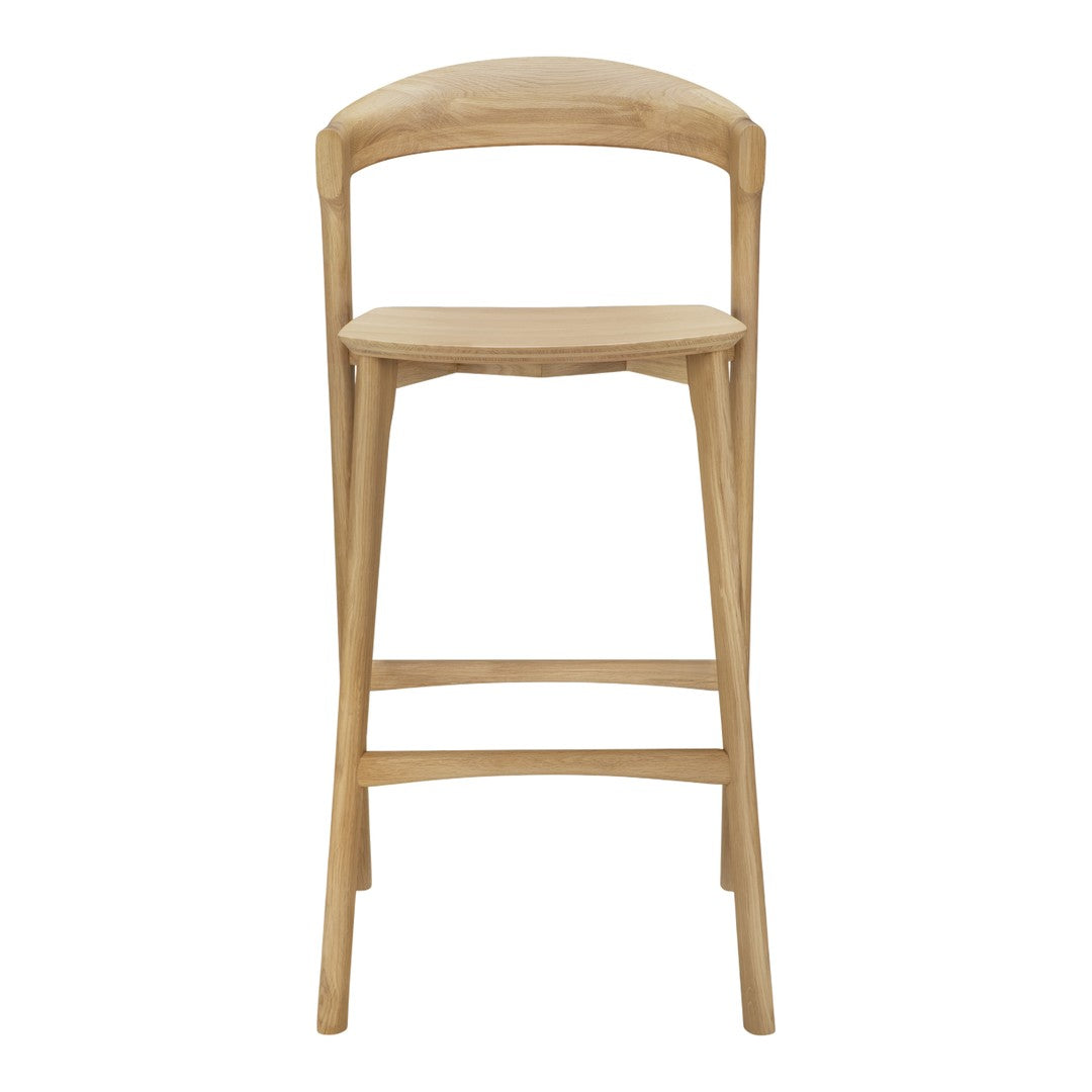 Natural light wood bar stool with a smooth finish and minimalist design. Ideal for modern decor.