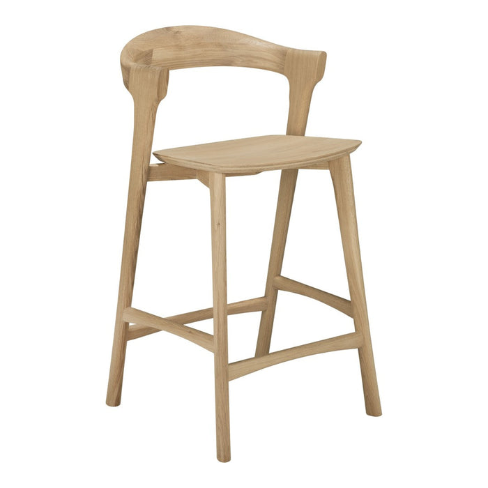 Natural light wood bar stool with a simple, modern design and smooth finish, featuring minimalistic curves.