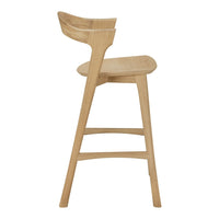 Natural light wood bar stool with a minimalist design and smooth, sleek lines. Perfect for modern interiors.