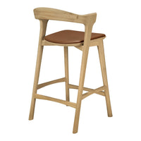 Light wooden bar stool with a brown leather seat, featuring a minimalist design and natural finish.