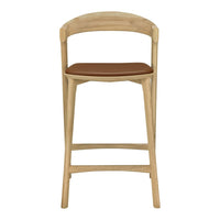 Natural wood frame with a light oak finish and a warm brown leather seat. Modern, minimalist design.