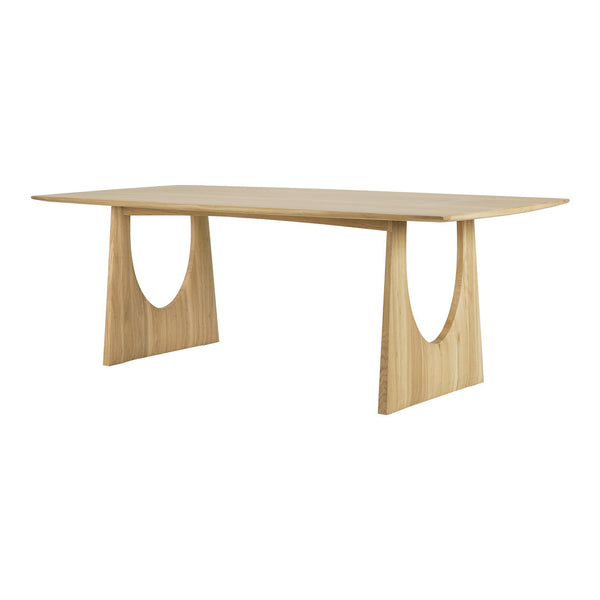 Natural wood dining table with a smooth finish and unique cutout base design in light beige tones.