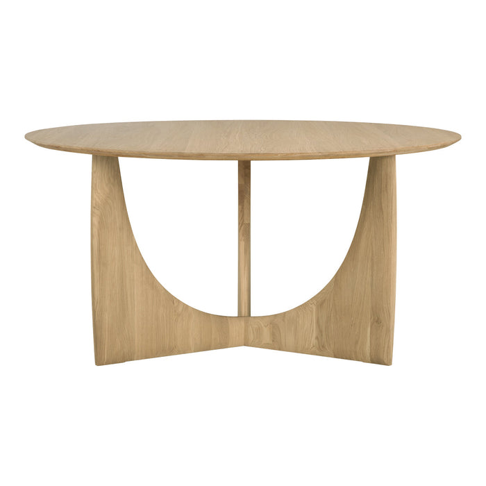 Round wooden dining table in light oak with minimalist curved leg design and natural finish.