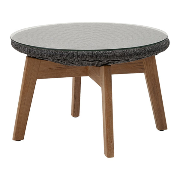 Round coffee table with a sleek glass top and a textured gray woven base, complemented by natural wood legs.