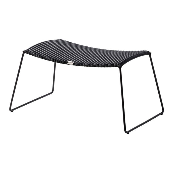 Black striped outdoor ottoman with sleek metal frame, ideal for modern patio decor.