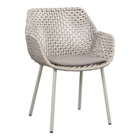Light beige woven chair with soft gray cushion, featuring a modern open pattern and sleek metal legs.