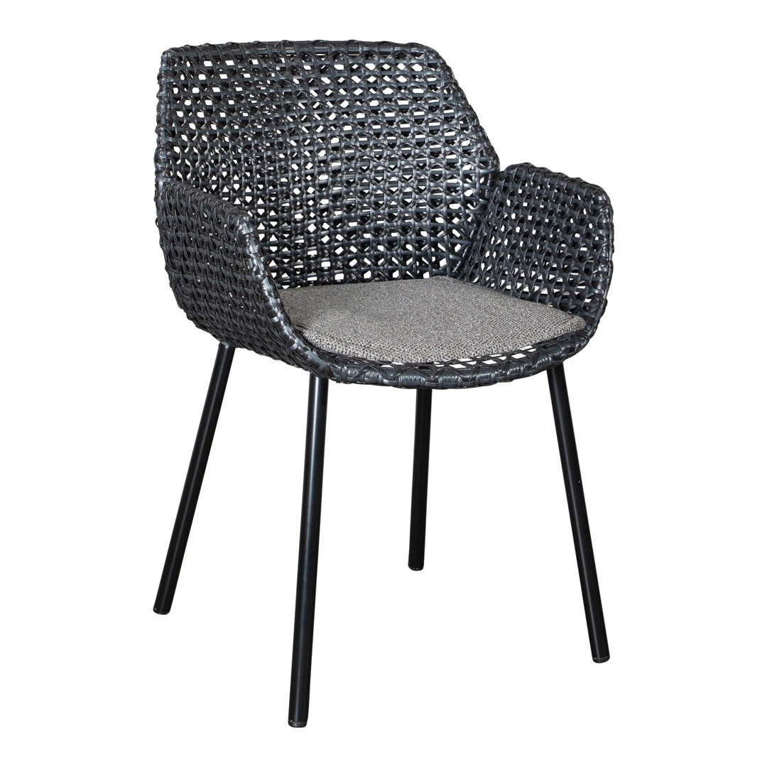 Gray woven chair with a textured pattern and a light gray seat cushion, complemented by sleek black legs.