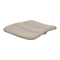 Beige cushion with subtle textured pattern and contoured shape for enhanced comfort and style. Perfect for any decor.