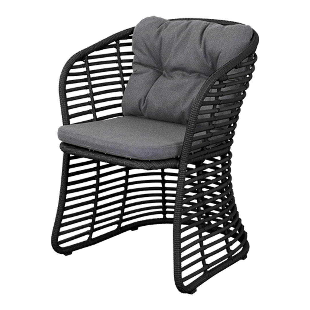 Black woven chair with gray cushion and tufted detailing, featuring a modern open pattern design.